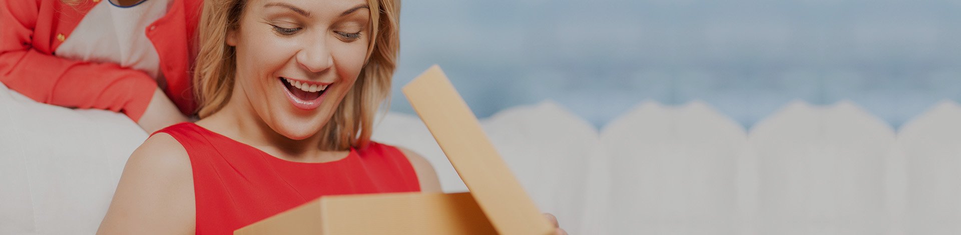 Happy Girl Opening Box